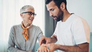 Naturopathic doctor talking with an elderly patient, photo by pixelfit/Getty Images