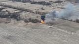 Still from a video published by the Ukrainian Armed Forces showing a Ukrainian soldier using a British-supplied Next-Generation Light Anti-Tank Weapon (NLAW) to destroy a Russian armored vehicle in an unspecified location in Ukraine, April 11, 2022, photo by Armed Forces of Ukraine/Aerorozv via Reuters Connect