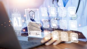 Doctor using a laptop with superimposed AI images of files above the keyboard, photo by The best photo for all/Getty Images
