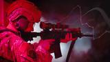 An Airman aims an MF Carbine assault rifle during night-firing training at F.E. Warren Air Force Base in Cheyenne, Wyoming, May 18, 2024, design by Carol Ponce/RAND; images by Staff Sgt. Kylee Warren/U.S. Air National Guard and iamchamp/Adobe Stock